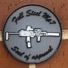 Imagen de parche de Full Steel MP7 sobre fondo de ladrillos
